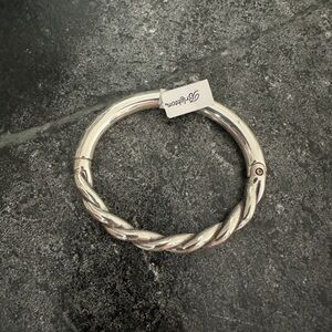 NWT Brand new, never worn Brighton Interlok Twist Hinged Bangle Bracelet.